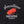 Load image into Gallery viewer, A close up of il porcellino salumi's logo screen printed on a black shirt.
